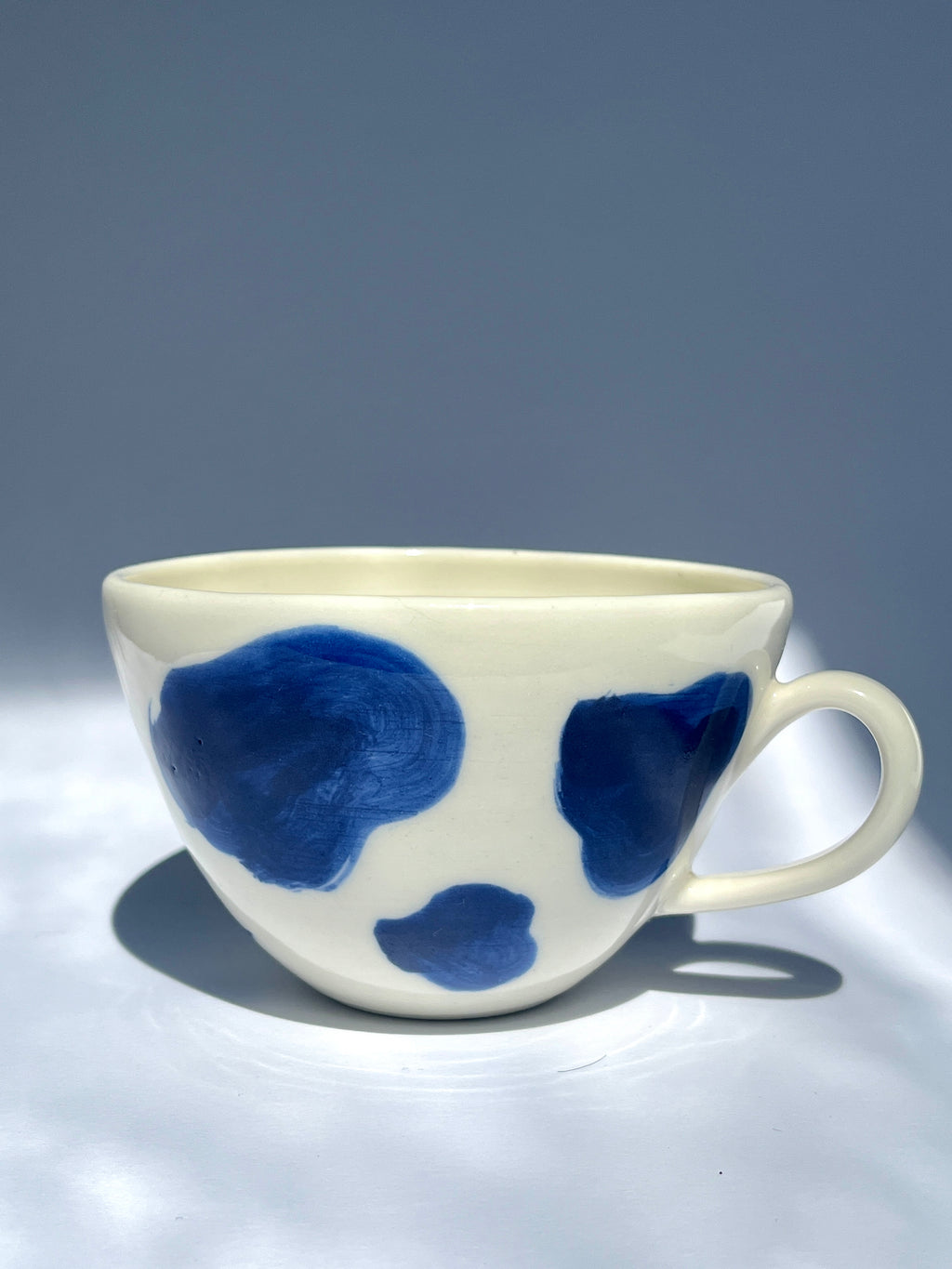 Cow print teacup