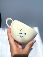 Pecking hen teacup